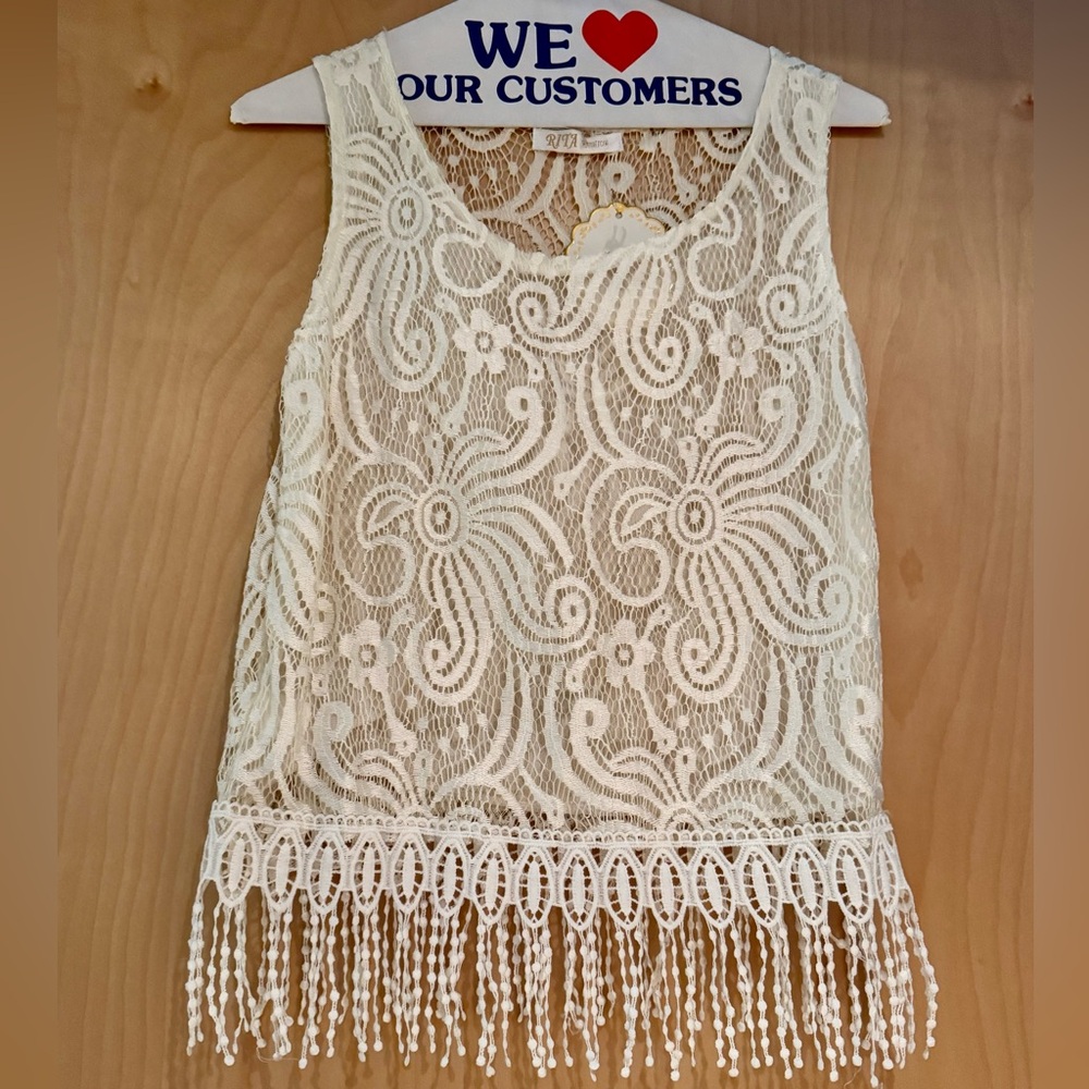 Sleeveless lace top with fringe